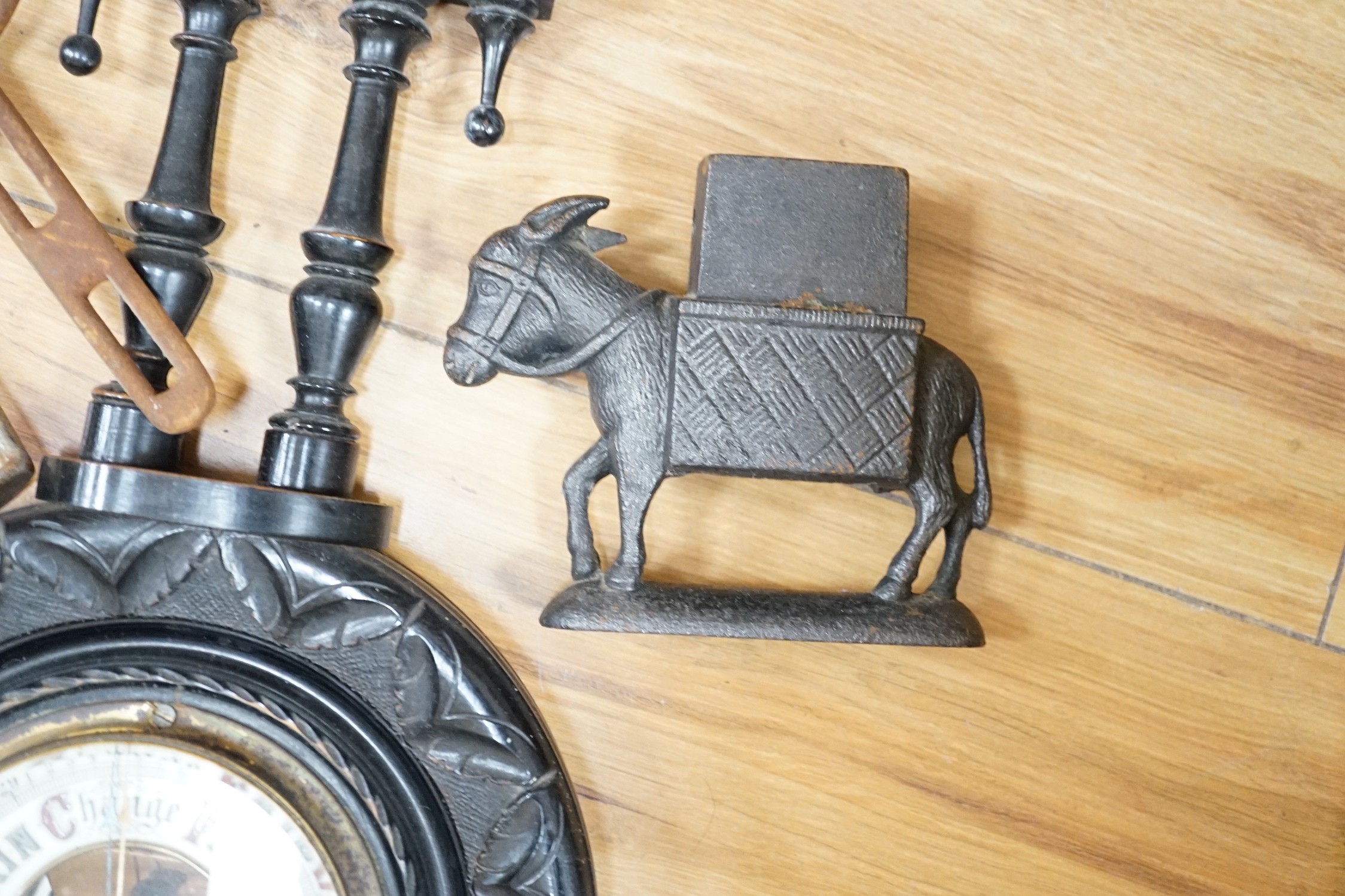Assorted horse accessories, iron castings, a Disraeli plaque, etc
